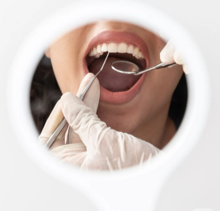 Dentist examining a patient